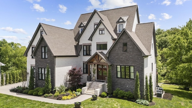 302 Cedar Hollow Ct, Lebanon, TN 37087 - view of front of property with french doors, a front lawn, brick siding, and a shingled roof