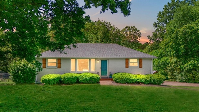 1304 Cheshire Dr, Nashville, TN 37207 - view of front of house featuring a lawn and roof with shingles