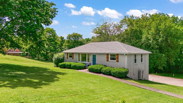 1304 Cheshire Dr, Nashville, TN 37207 - ranch-style home with a front lawn and view of scattered trees
