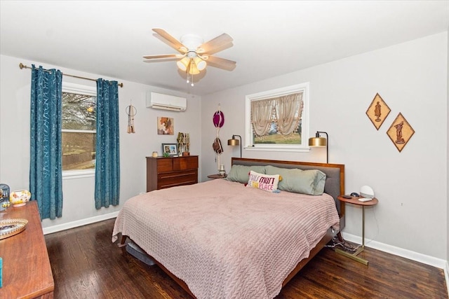 1304 Cheshire Dr, Nashville, TN 37207 - bedroom with an AC wall unit, wood finished floors, baseboards, and ceiling fan