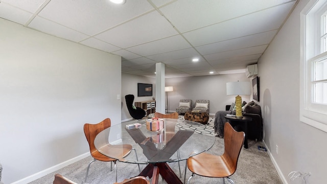 1304 Cheshire Dr, Nashville, TN 37207 - dining room featuring an AC wall unit, baseboards, recessed lighting, carpet flooring, and a paneled ceiling