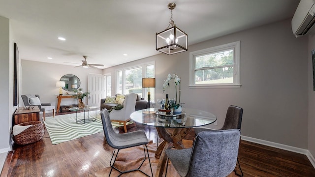 1304 Cheshire Dr, Nashville, TN 37207 - dining room with a wall mounted AC, plenty of natural light, wood finished floors, and recessed lighting