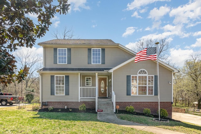 807 Sugarcane Way, Clarksville, TN 37040 - traditional-style home featuring a porch and a front yard