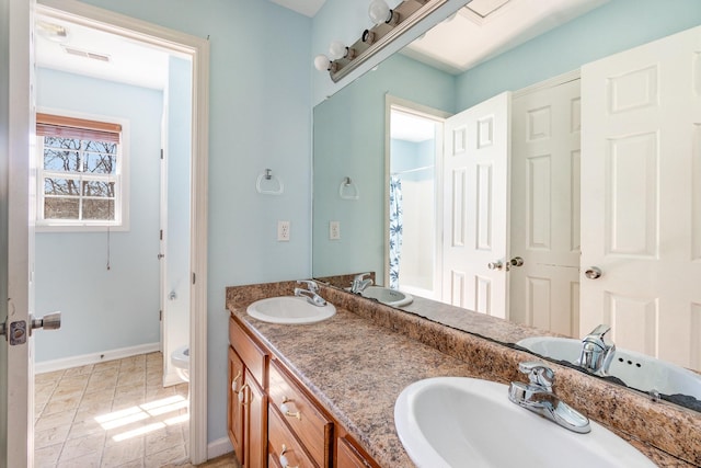 807 Sugarcane Way, Clarksville, TN 37040 - full bath with baseboards, toilet, and double vanity