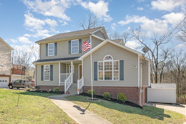 807 Sugarcane Way, Clarksville, TN 37040 - traditional-style home featuring a porch and a front yard