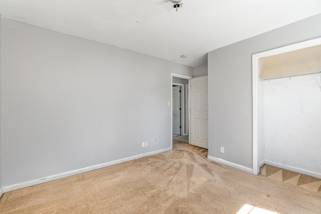 807 Sugarcane Way, Clarksville, TN 37040 - unfurnished bedroom featuring light colored carpet, baseboards, and a closet