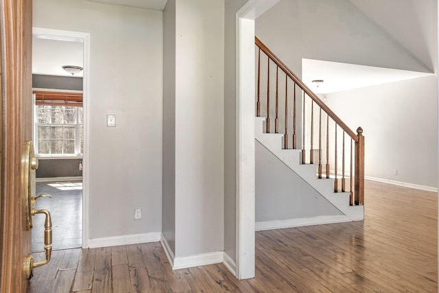 807 Sugarcane Way, Clarksville, TN 37040 - hallway with wood-type flooring, baseboards, and stairs