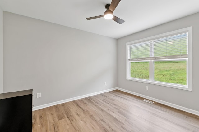 2955 Spring Place Rd, Belfast, TN 37019 - empty room featuring light wood finished floors, ceiling fan, and baseboards