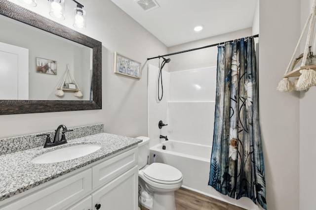 2955 Spring Place Rd, Belfast, TN 37019 - bathroom featuring wood finished floors, toilet, shower / bath combo with shower curtain, and vanity