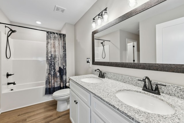 2955 Spring Place Rd, Belfast, TN 37019 - full bathroom featuring wood finished floors, shower / bath combination with curtain, toilet, and double vanity