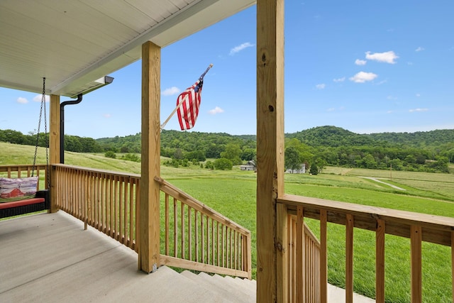 2955 Spring Place Rd, Belfast, TN 37019 - deck with a wooded view, a lawn, and a rural view