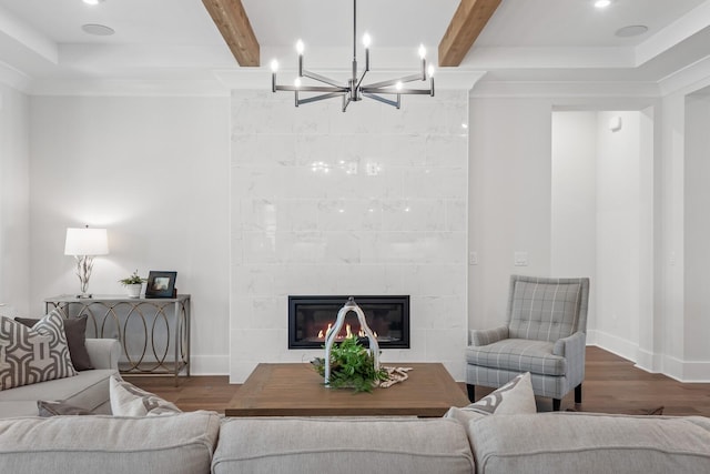 7424 Leelee Dr, Franklin, TN 37064 - living area with wood finished floors, a chandelier, a fireplace, beam ceiling, and baseboards