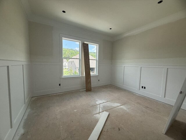7424 Leelee Dr, Franklin, TN 37064 - unfurnished room featuring a decorative wall, wainscoting, and ornamental molding