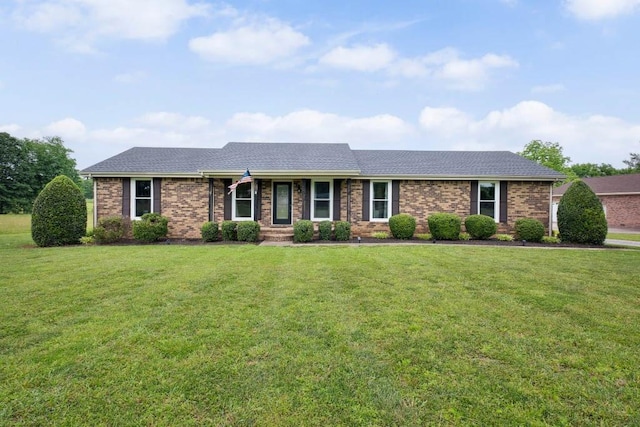 1517 Brian St, Lebanon, TN 37087 - single story home featuring a front yard, brick siding, and a shingled roof