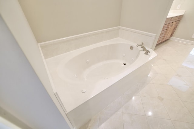 1005 Peck Pl, Hendersonville, TN 37075 - bathroom featuring tile patterned floors, vanity, and a whirlpool tub