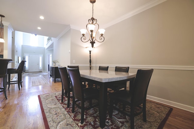 1005 Peck Pl, Hendersonville, TN 37075 - dining area with ornamental molding, baseboards, light wood-type flooring, a chandelier, and recessed lighting