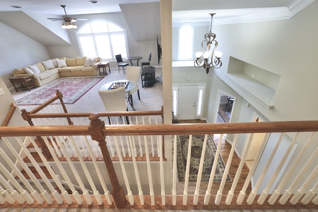 1005 Peck Pl, Hendersonville, TN 37075 - staircase featuring plenty of natural light, crown molding, ceiling fan, carpet, and a chandelier