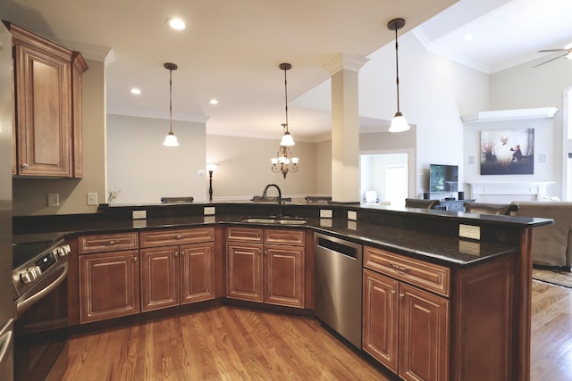 1005 Peck Pl, Hendersonville, TN 37075 - kitchen featuring stainless steel dishwasher, a sink, open floor plan, wood finished floors, and crown molding