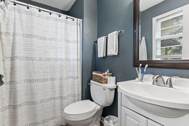 211 Elmwood Dr, Murfreesboro, TN 37128 - full bathroom featuring a textured ceiling, a textured wall, toilet, vanity, and a shower with curtain