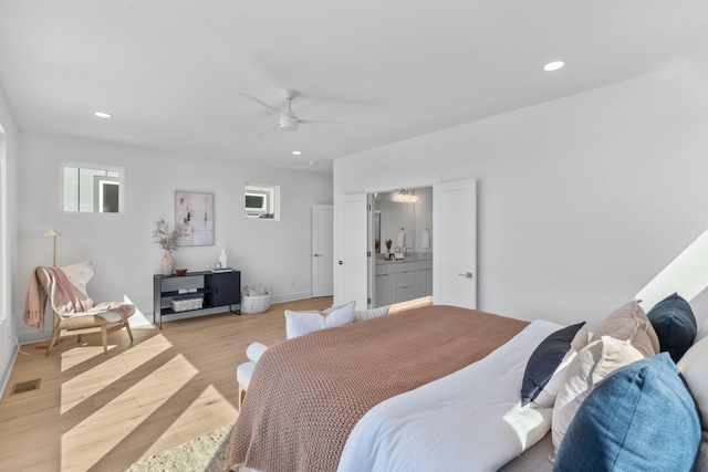 bedroom featuring multiple windows, light wood finished floors, recessed lighting, baseboards, and a ceiling fan