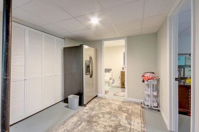 2878 Gusty Ln, Clarksville, TN 37043 - bedroom featuring a closet, a paneled ceiling, ensuite bathroom, and baseboards
