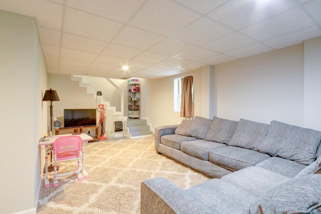 2878 Gusty Ln, Clarksville, TN 37043 - carpeted living area featuring stairs, a paneled ceiling, and baseboards