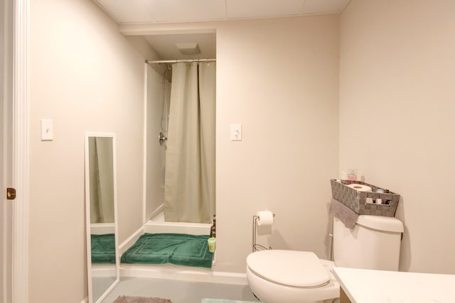 2878 Gusty Ln, Clarksville, TN 37043 - bathroom with toilet, a shower with curtain, baseboards, and vanity