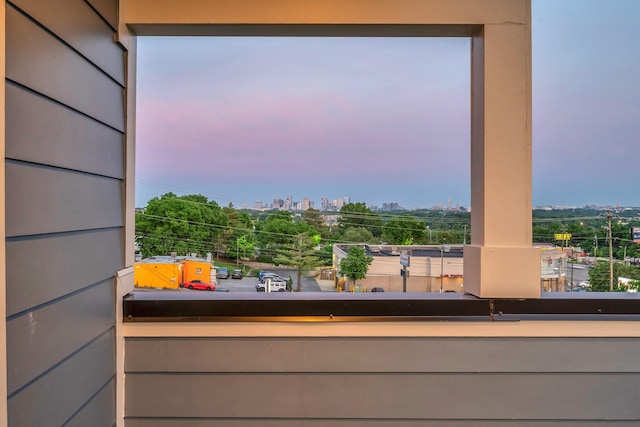 view of balcony at dusk
