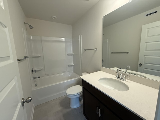 bathroom featuring toilet, vanity, tub / shower combination, and tile patterned flooring