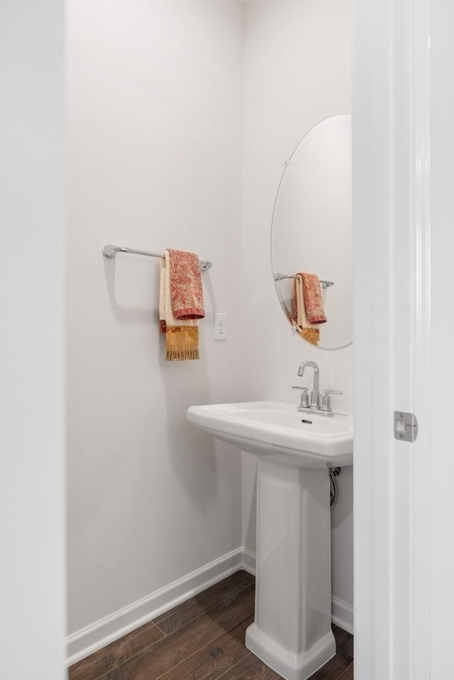 5210 Gladecress Ln, Hermitage, TN 37076 - bathroom featuring baseboards, wood finished floors, and a sink