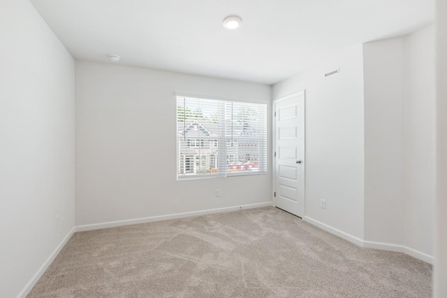 5210 Gladecress Ln, Hermitage, TN 37076 - empty room with light colored carpet, baseboards, and a smoke detector