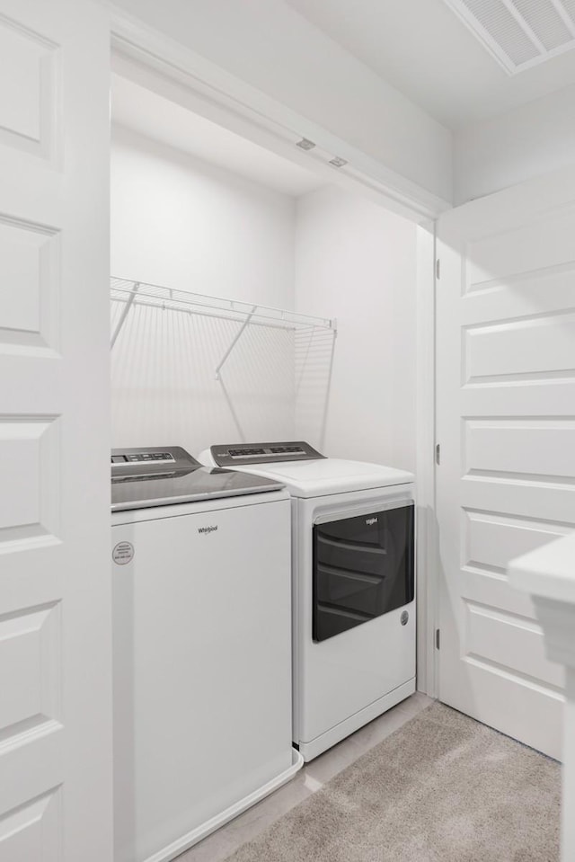 5210 Gladecress Ln, Hermitage, TN 37076 - laundry room featuring separate washer and dryer