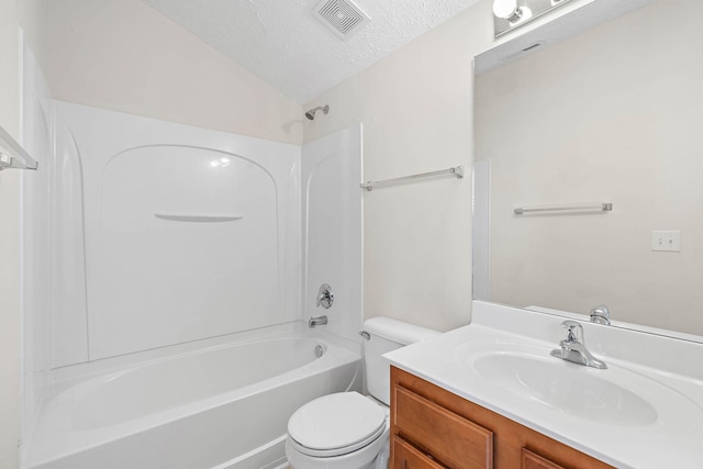full bathroom with toilet, a textured ceiling, tub / shower combination, vanity, and lofted ceiling