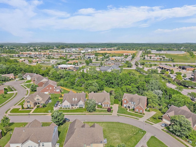 aerial view of property's location featuring nearby suburban area