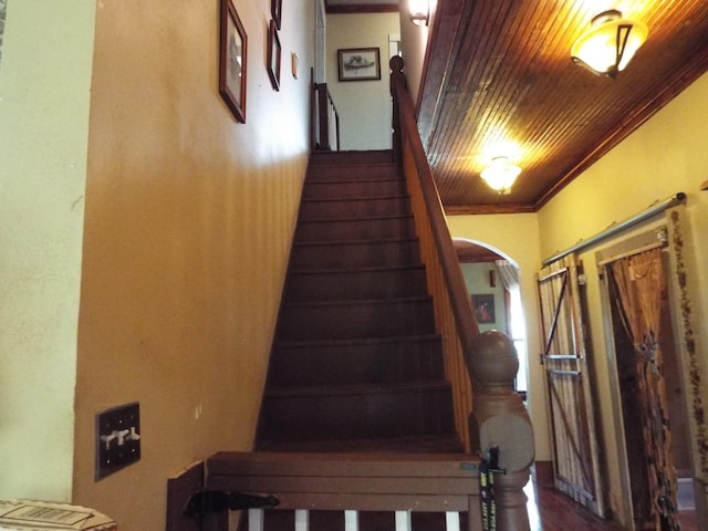 165 E Main St, Alexandria, TN 37012 - staircase with arched walkways and wood ceiling