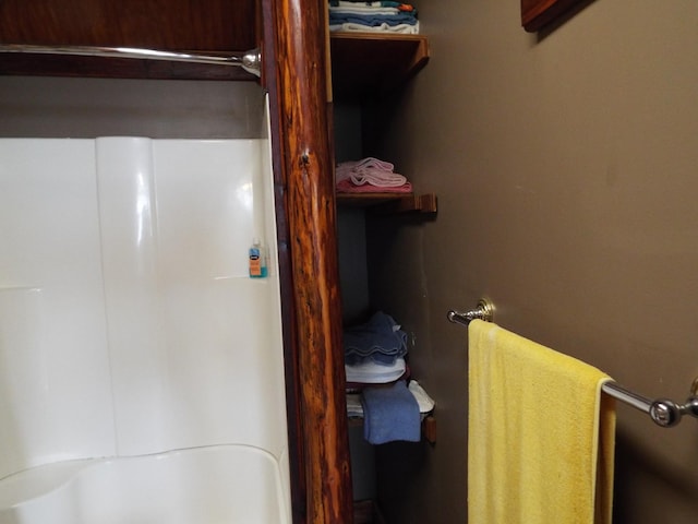165 E Main St, Alexandria, TN 37012 - bathroom featuring water heater and a shower