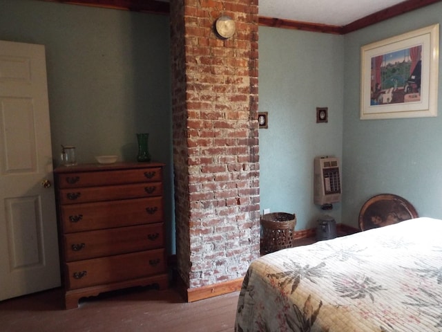 165 E Main St, Alexandria, TN 37012 - bedroom featuring heating unit, wood finished floors, and crown molding