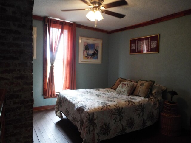 165 E Main St, Alexandria, TN 37012 - bedroom with hardwood / wood-style flooring, ornamental molding, baseboards, and a ceiling fan