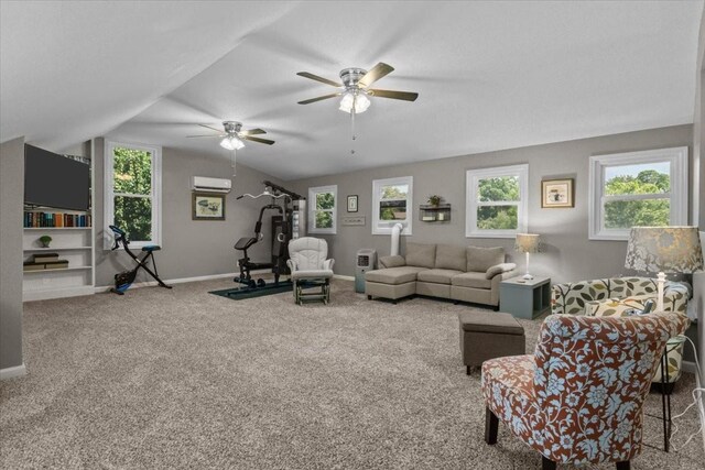 1209 Corlew Dr, Burns, TN 37029 - living area with carpet floors, a wall mounted air conditioner, lofted ceiling, a ceiling fan, and plenty of natural light