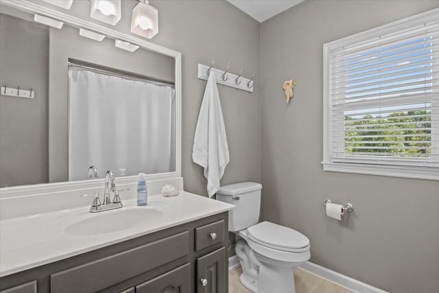 1209 Corlew Dr, Burns, TN 37029 - bathroom featuring toilet, baseboards, vanity, and a shower with curtain