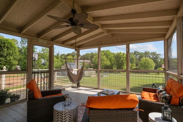 1209 Corlew Dr, Burns, TN 37029 - sunroom / solarium with ceiling fan, an outdoor hangout area, and view of scattered trees