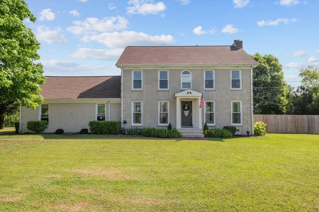 1209 Corlew Dr, Burns, TN 37029 - colonial-style house featuring a chimney