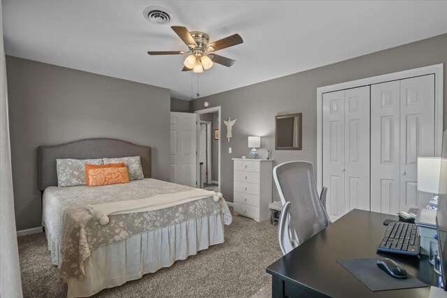 1209 Corlew Dr, Burns, TN 37029 - carpeted bedroom featuring a desk, a closet, baseboards, and a ceiling fan