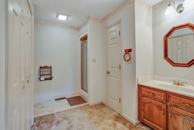 735 Railroad Bed Pike, Summertown, TN 38483 - full bath featuring a shower stall, a textured ceiling, vanity, and baseboards