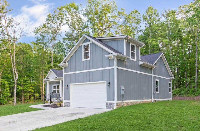 120 Destineys Way, Gruetli Laager, TN 37339 - view of front of home featuring concrete driveway, a front lawn, and a garage