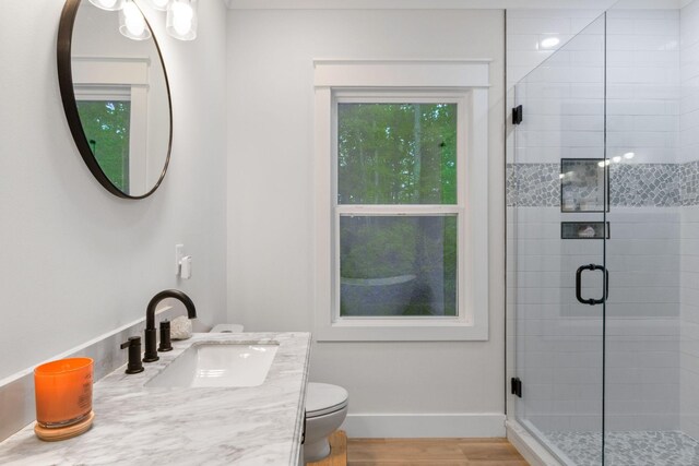 120 Destineys Way, Gruetli Laager, TN 37339 - bathroom featuring a shower stall, toilet, wood finished floors, baseboards, and vanity
