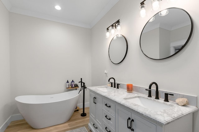 120 Destineys Way, Gruetli Laager, TN 37339 - full bathroom featuring wood finished floors, baseboards, double vanity, a freestanding bath, and recessed lighting