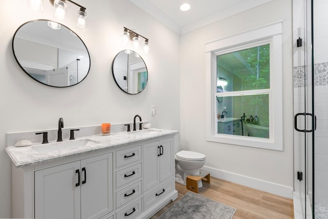120 Destineys Way, Gruetli Laager, TN 37339 - bathroom featuring wood finished floors, a stall shower, baseboards, double vanity, and toilet