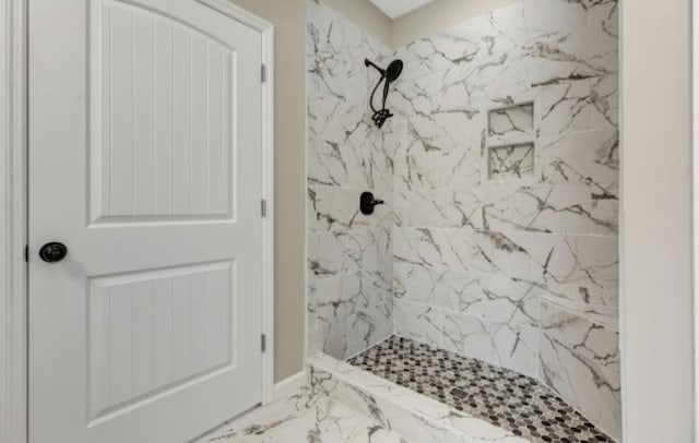 2582 Gap Rd, Altamont, TN 37301 - full bathroom featuring a marble finish shower and marble look tile flooring