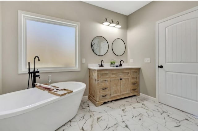 2582 Gap Rd, Altamont, TN 37301 - full bathroom featuring marble look tile flooring, double vanity, a freestanding bath, and baseboards